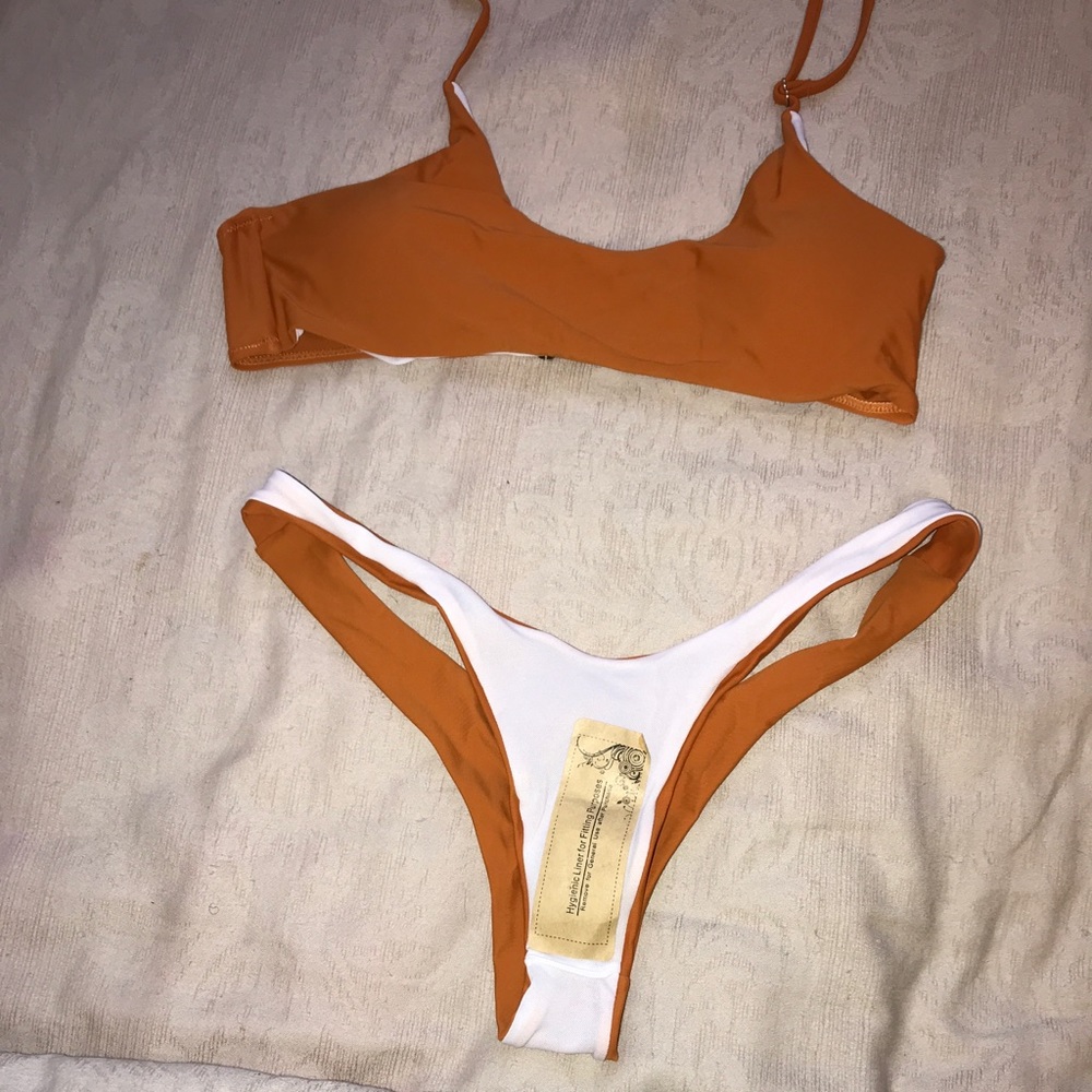 Orange toned bathing suit!